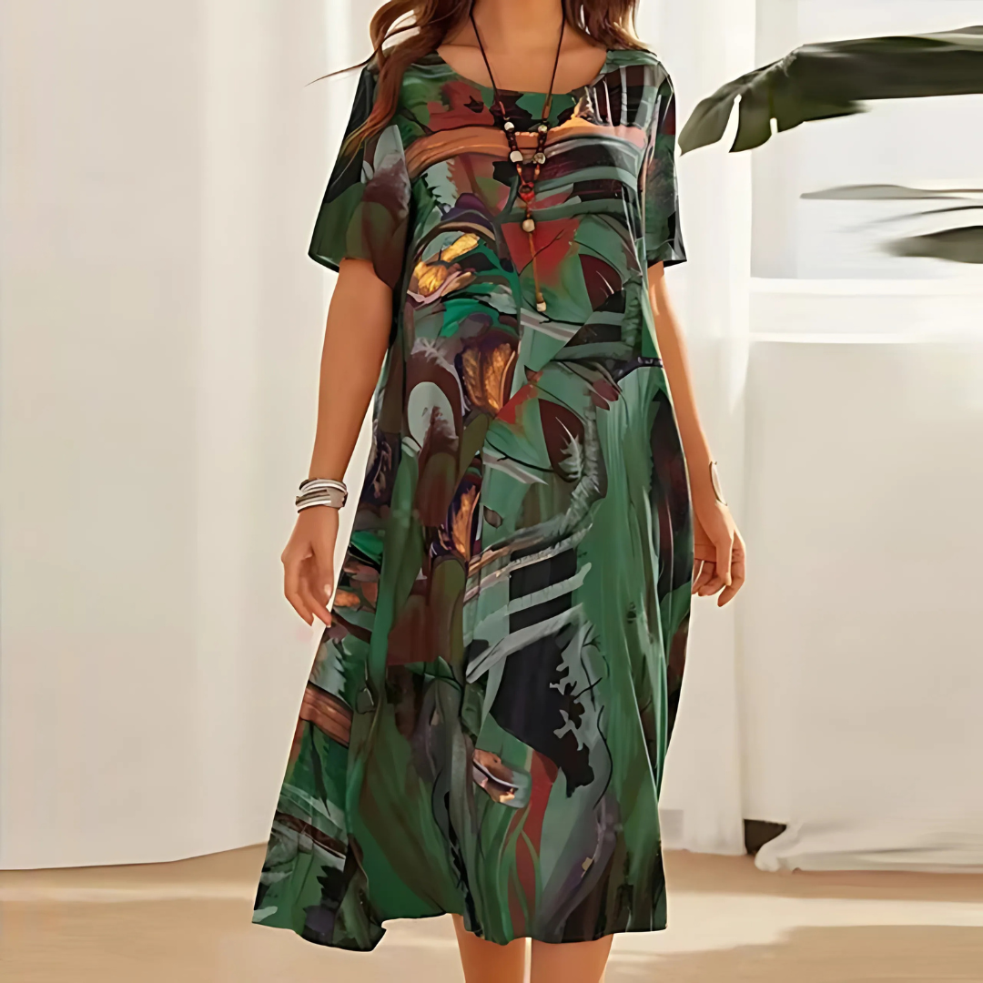 Elegant floral midi dress in vibrant multicolor bloom print with flattering feminine silhouette