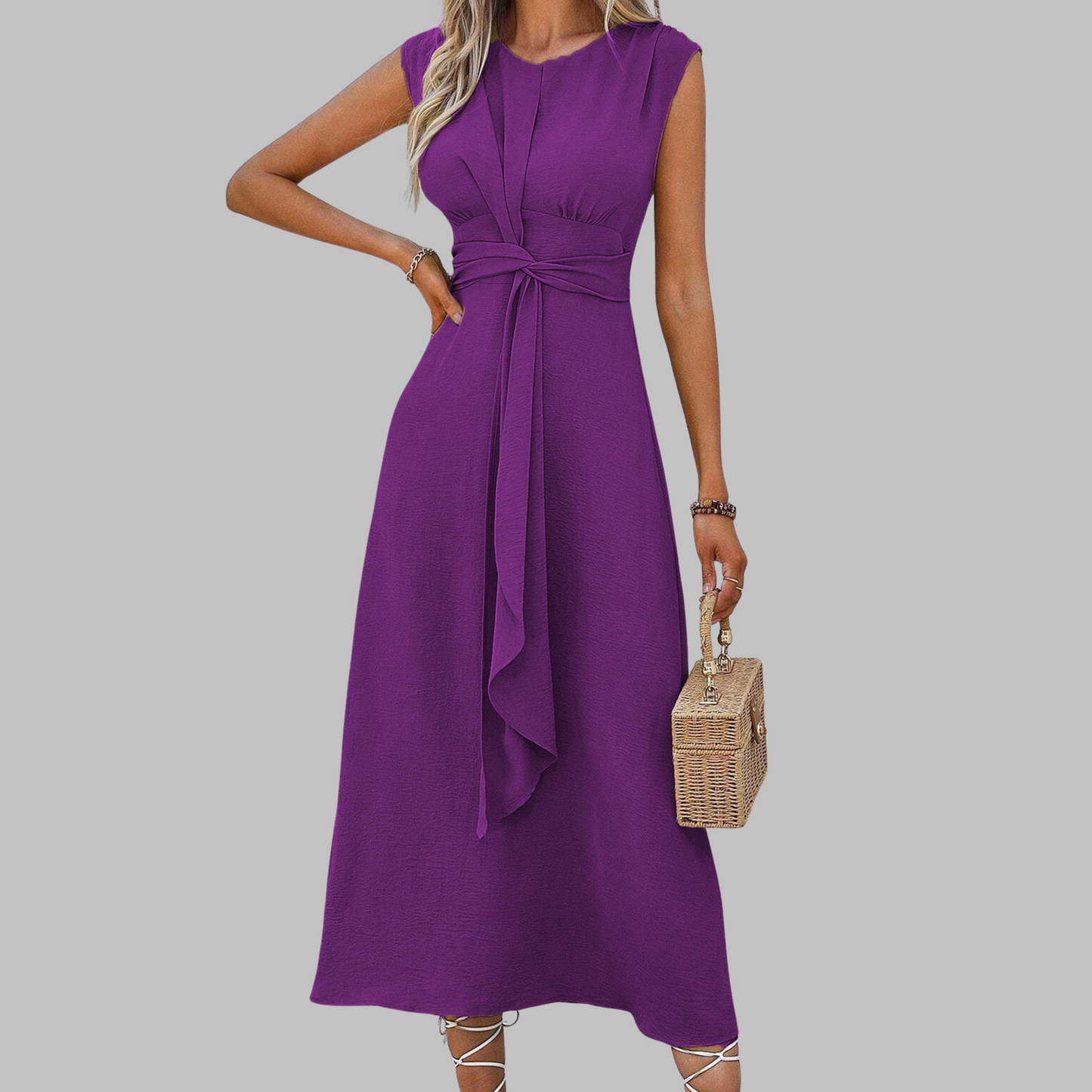 Elegant sleeveless maxi dress with round neckline in flowing graceful silhouette for women
