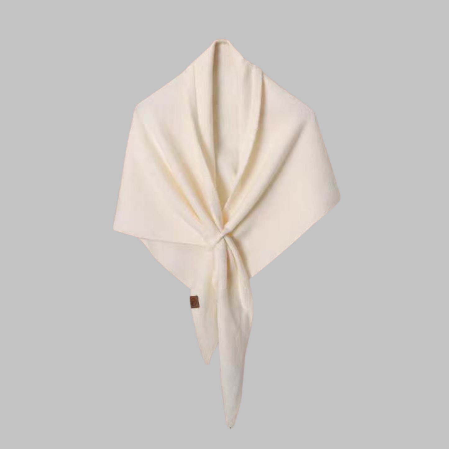 Classy soft triangle shawl wrap in neutral tone, elegant drape for versatile all-day wear