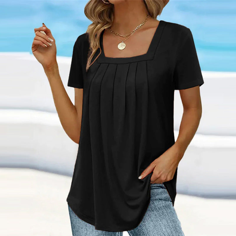 Elegant white pleated blouse with soft front pleats, refined silhouette for workwear and casual chic style