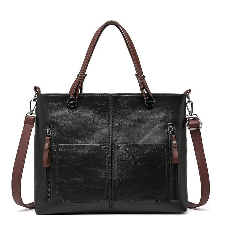 Delilah black vegan leather structured tote bag boxy silhouette with practical pockets