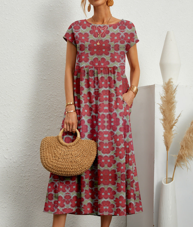 Elegant floral midi dress with relaxed flared silhouette in soft feminine print