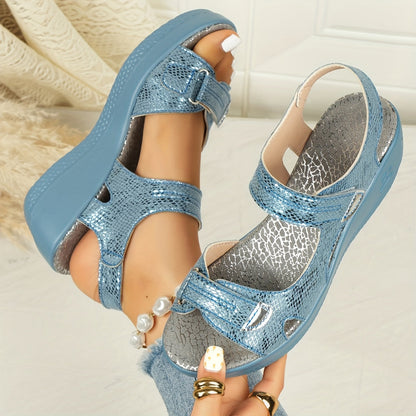 Women's beige adjustable wedge sandals with cushioned sole and elegant strap design
