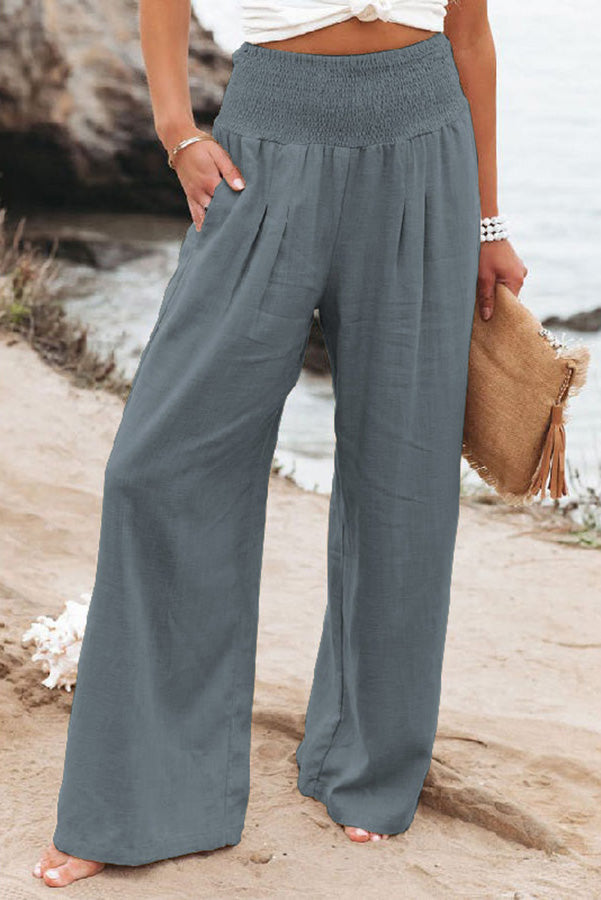 Women's wide leg vacation trousers in a breezy flowing silhouette with comfortable high-rise elastic waistband