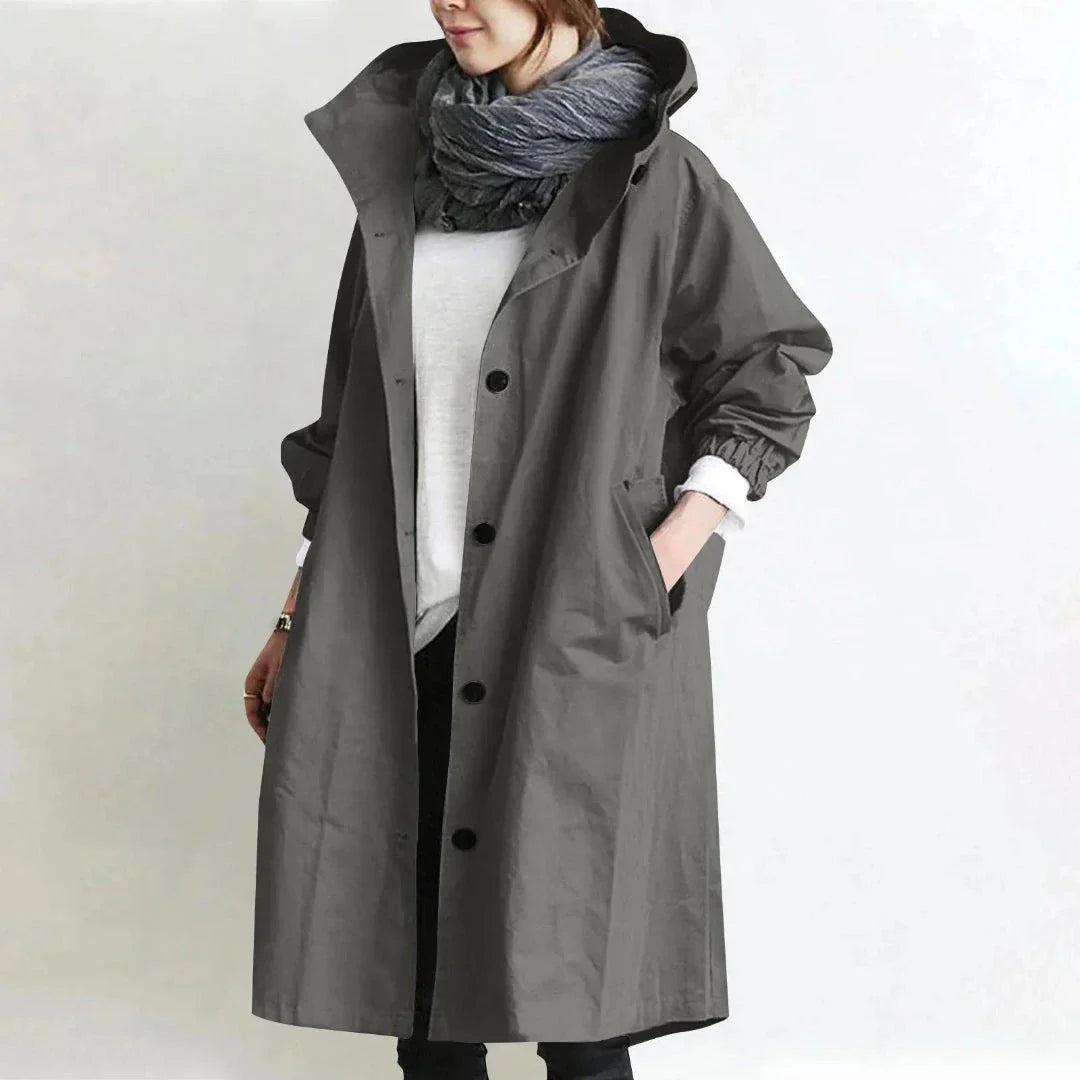 Abigail women's beige longline trench coat with adjustable hood and relaxed minimalist fit