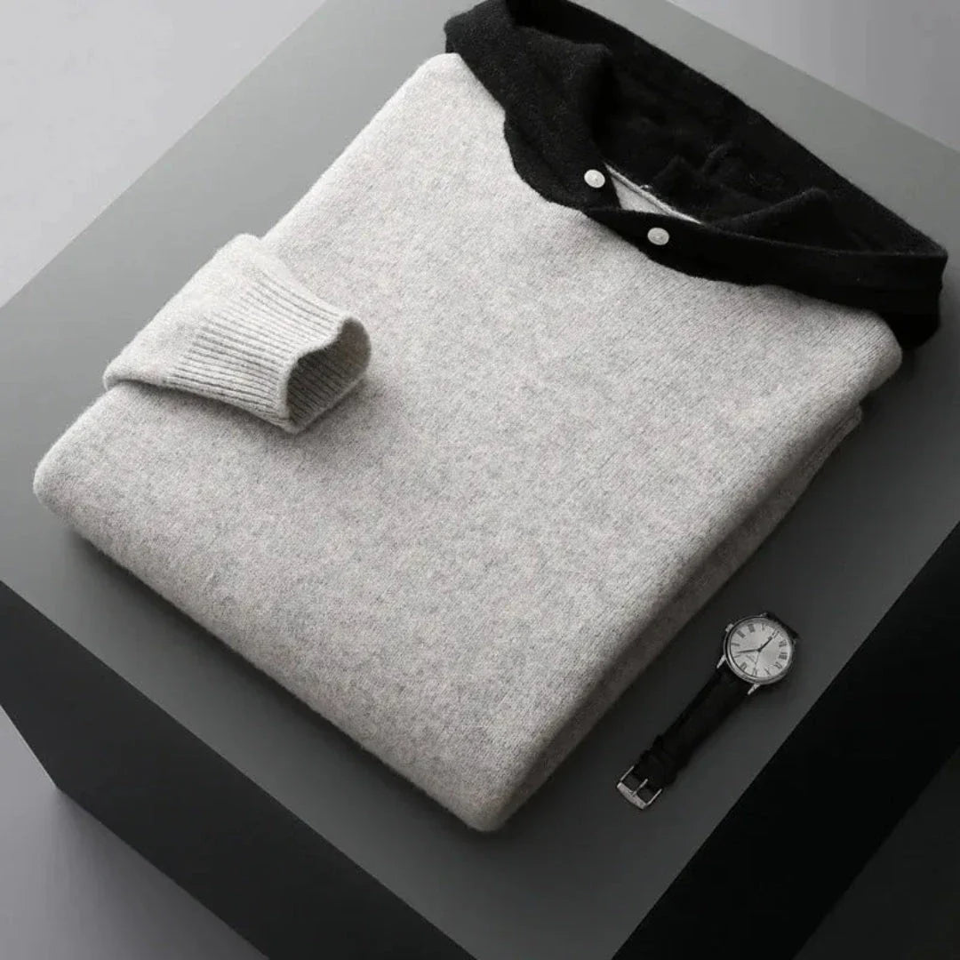 Ace merino wool hoodie in classic style with ribbed cuffs and distinctive button-detail hood