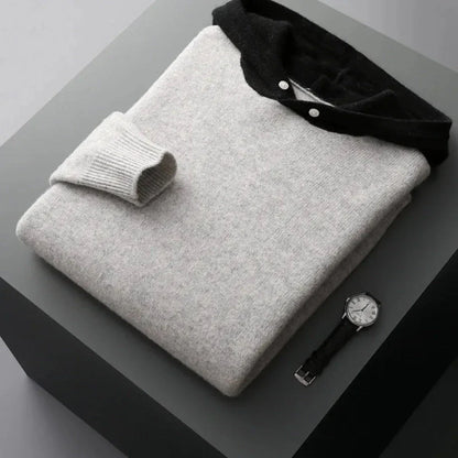 Ace merino wool hoodie in classic style with ribbed cuffs and distinctive button-detail hood