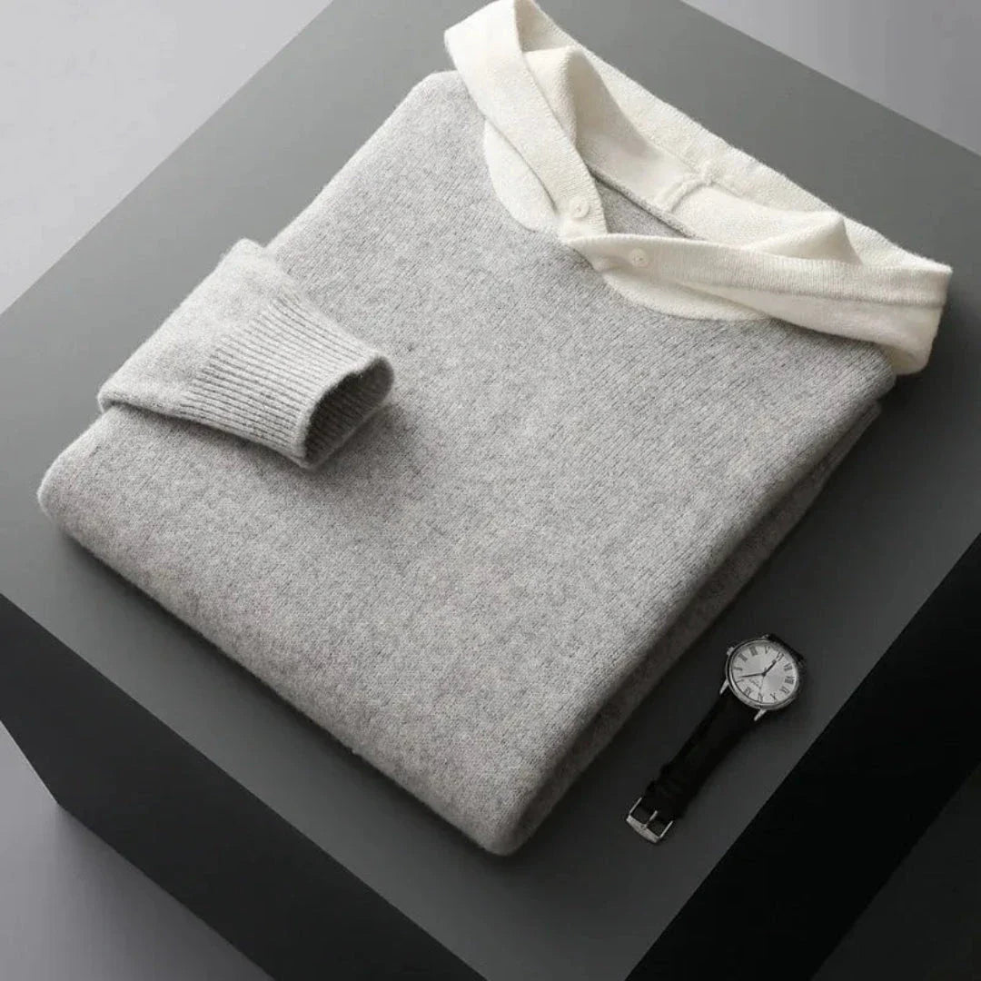 Ace merino wool hoodie in classic style with ribbed cuffs and distinctive button-detail hood