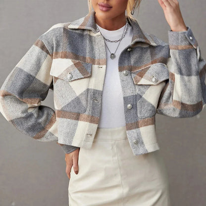Cropped button-up plaid jacket with bold pattern, modern fit, and chest flap pockets