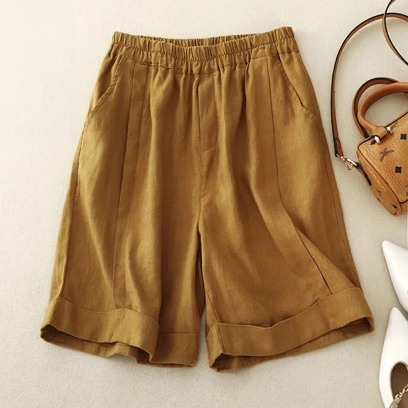 Beige linen blend relaxed-fit shorts with rolled cuffs and elastic waistband