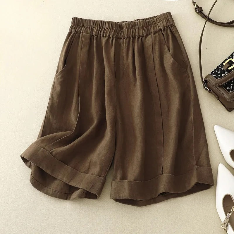 Beige linen blend relaxed-fit shorts with rolled cuffs and elastic waistband