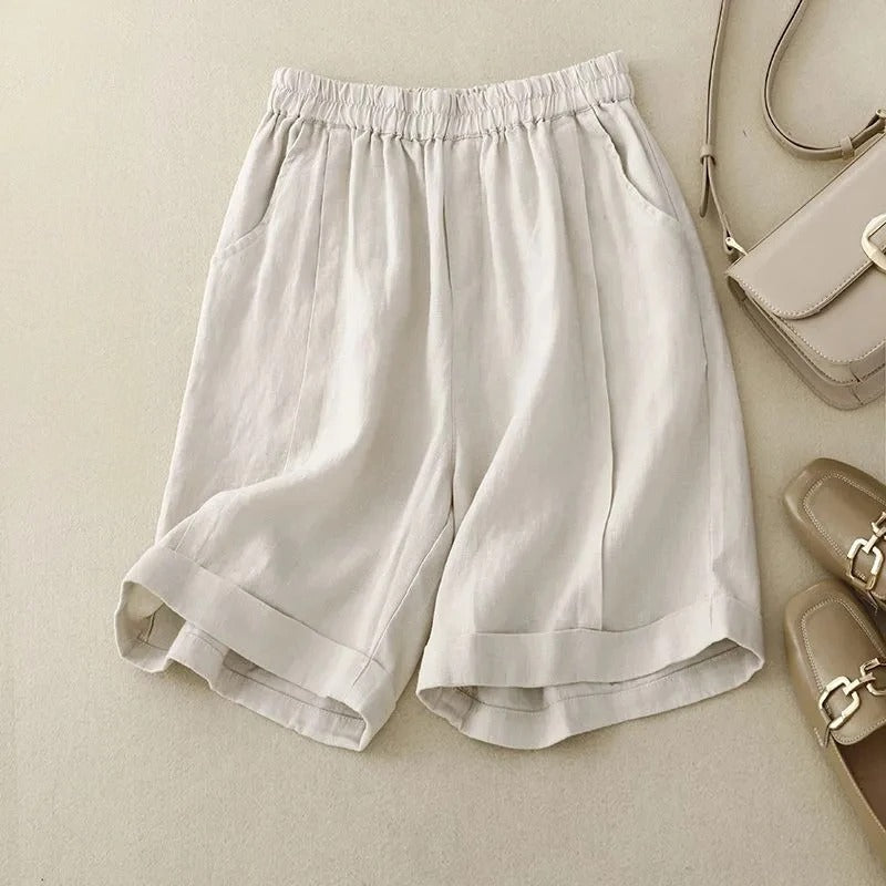 Adele relaxed-fit linen shorts with cuffed hem, elastic waistband, and side pockets for effortless style
