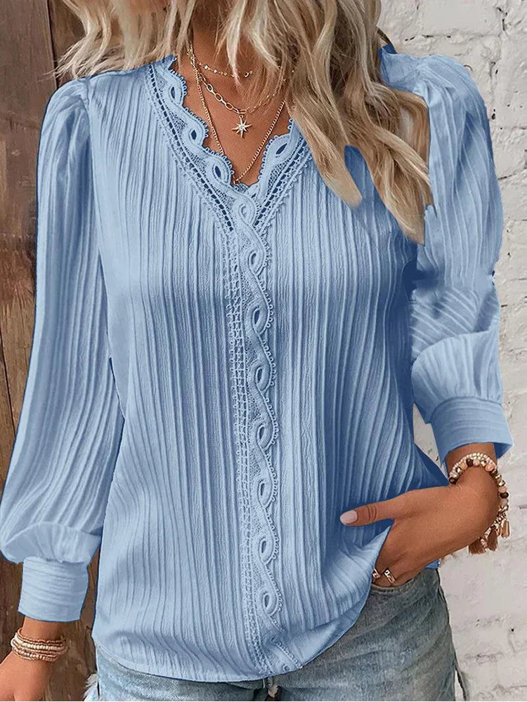 Ivory chiffon blouse with intricate lace neckline detail, relaxed feminine fit for spring