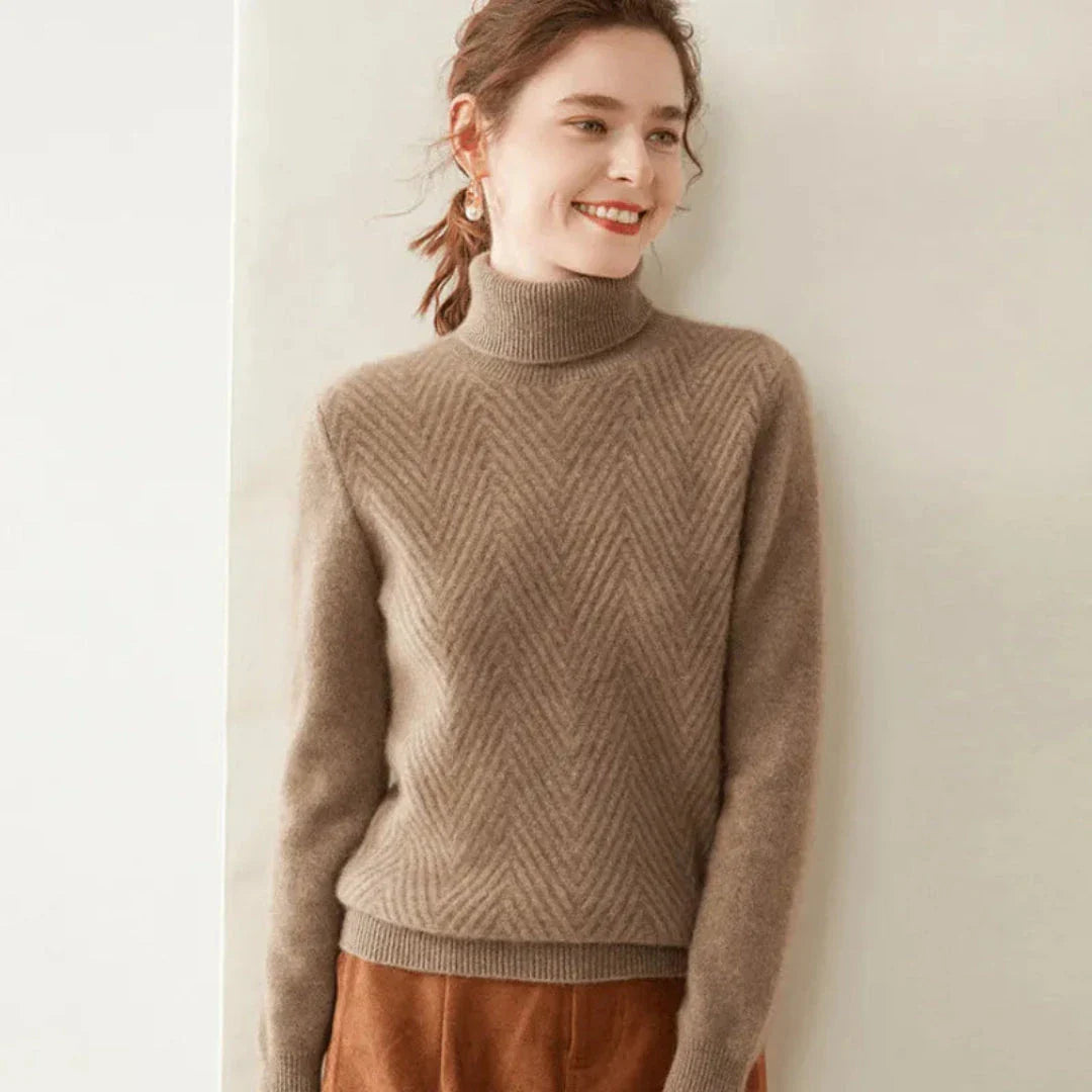 Ivory cashmere wool mock neck sweater with chevron knit pattern and ribbed cuffs