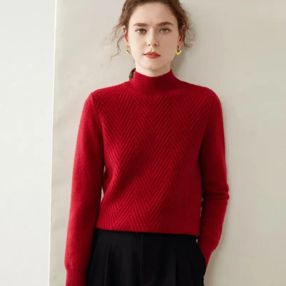 Ivory cashmere wool mock neck sweater with chevron knit pattern and ribbed cuffs