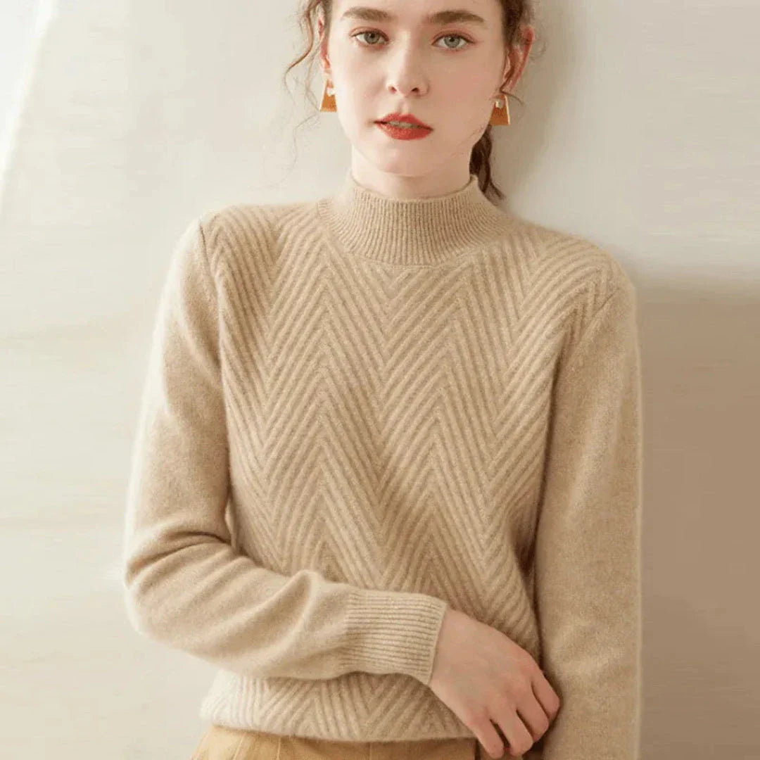 Ivory cashmere wool mock neck sweater with chevron knit pattern and ribbed cuffs