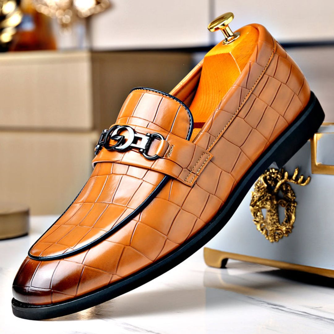 Alexander buckle loafers in polished textured leather with sleek metal buckle detail for formal or casual wear