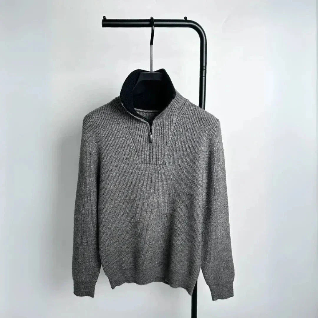 Beige ribbed knit quarter-zip sweater with contrasting stand-up collar for modern layering
