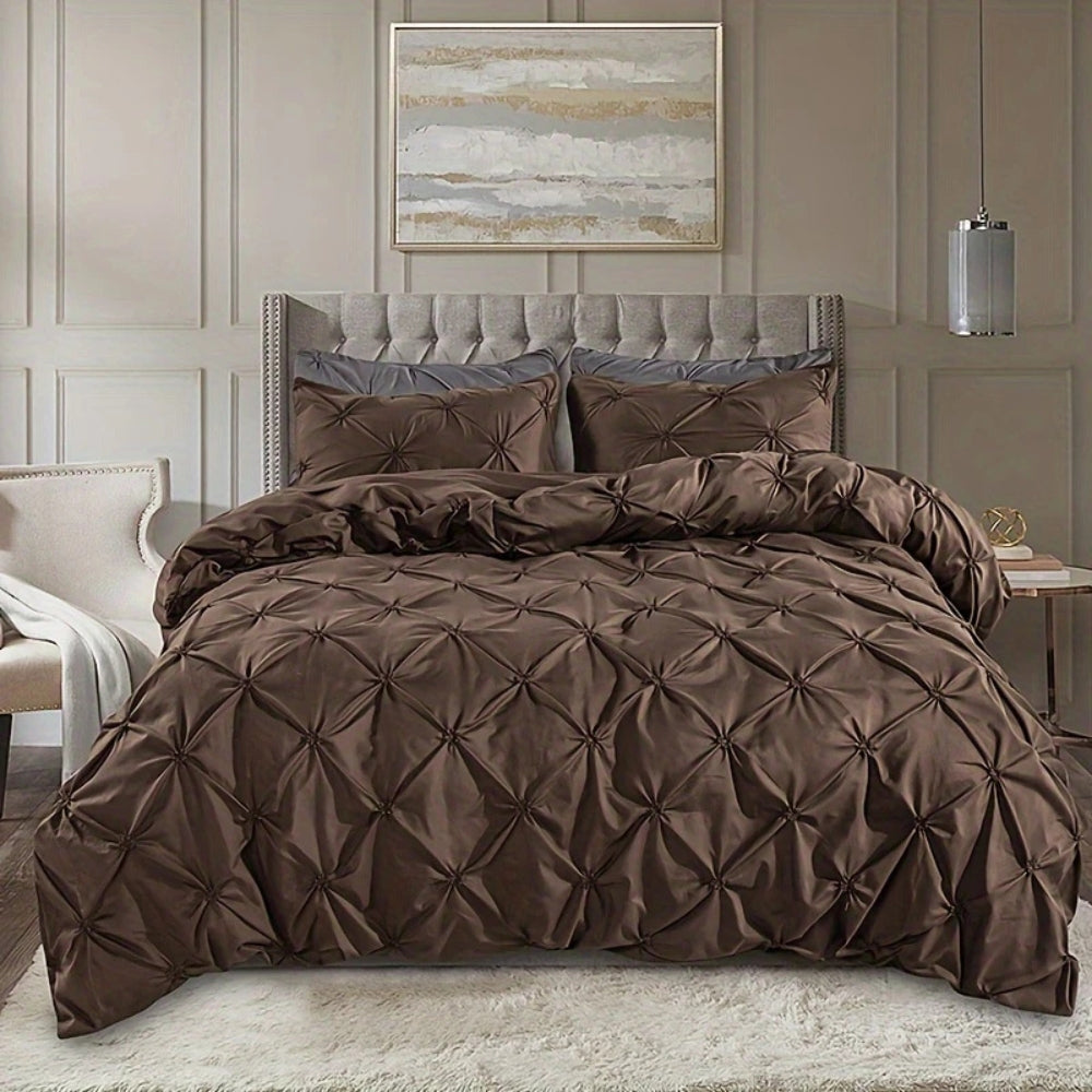 White cotton pinch pleat duvet cover set with hotel-inspired textural design and modern silhouette