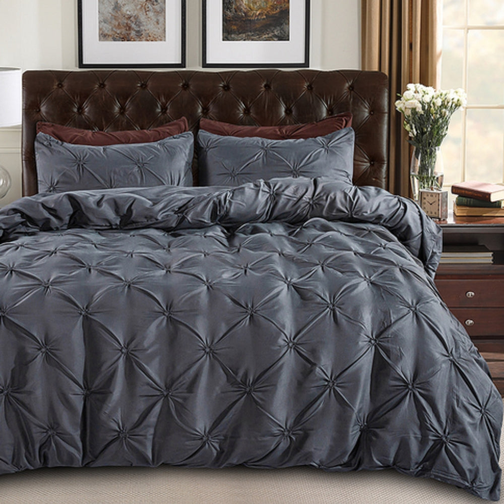 White cotton pinch pleat duvet cover set with hotel-inspired textured design and modern tailored style