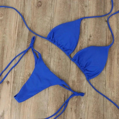 Classic triangle string bikini set in versatile two-piece style with adjustable halter top and tie-side bottoms
