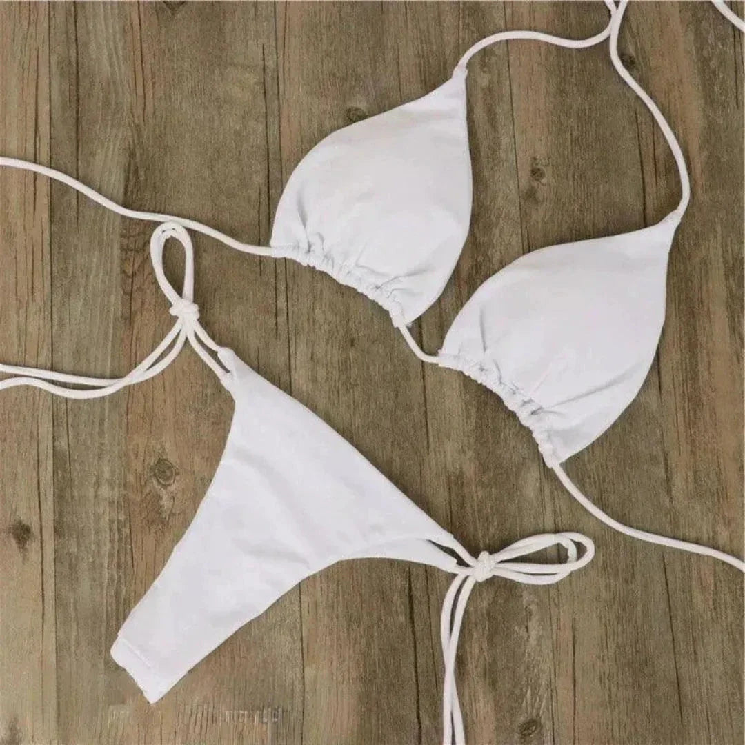 Classic triangle string bikini set in solid color with adjustable halter ties and tie-side bottoms