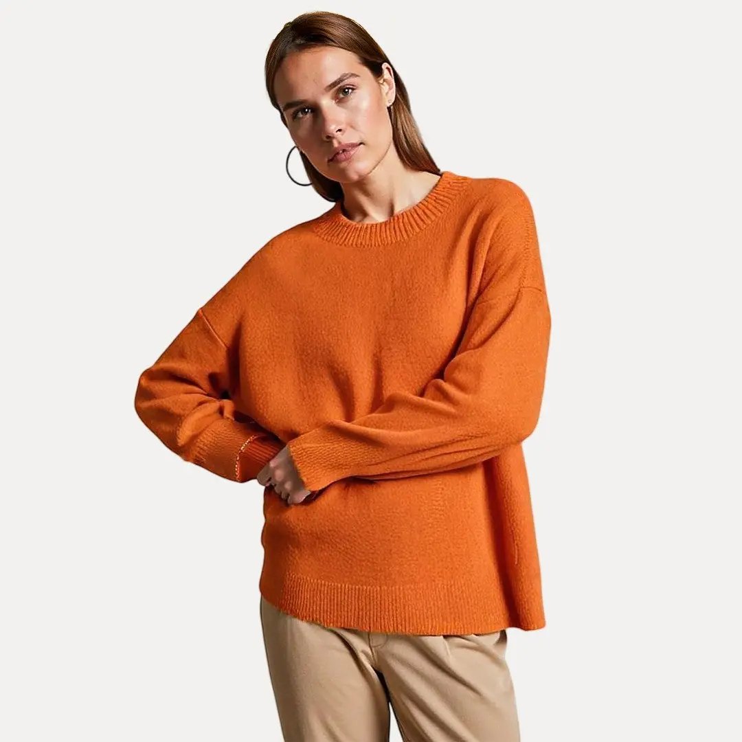 Arabella oversized knitted sweater in neutral tone with relaxed loose fit, perfect for cozy layering