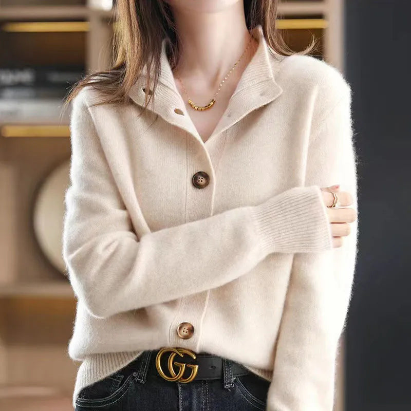 Arlina ivory merino wool cardigan with sculpted knit texture and feminine relaxed drape