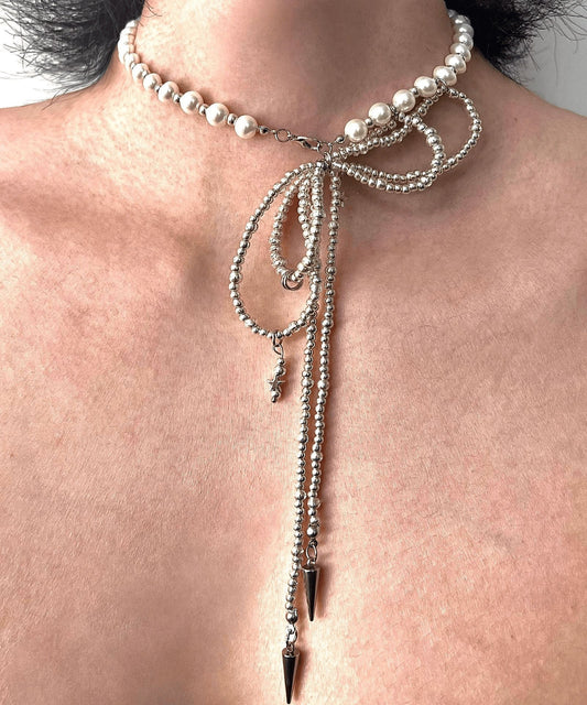 Collier avec pendentif en acier inoxydable et perles en forme de nœud papillon en soie artificielle - Wavlynn