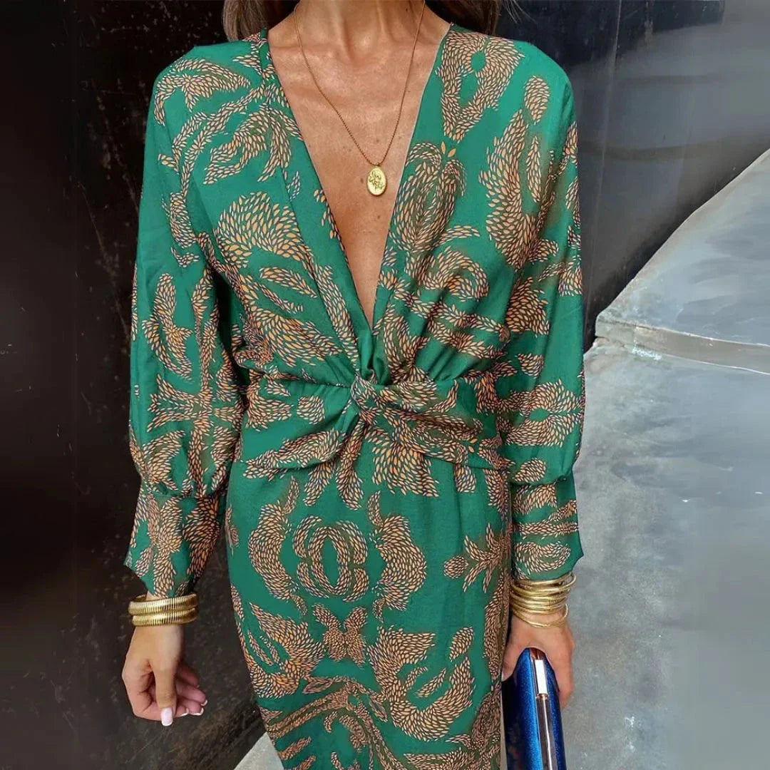 Flowy maxi dress with twist-front waist detail in bohemian silhouette for resort or evening wear