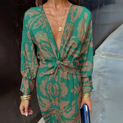 Flowy maxi dress with twist-front waist detail in bohemian silhouette for resort or evening wear