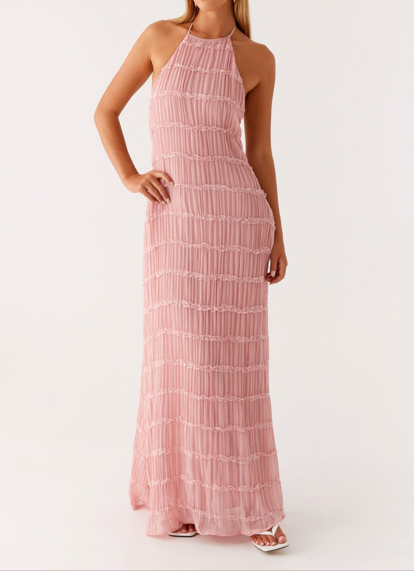 Elegant black halter maxi dress with flowing skirt and sculpting silhouette for formal occasions