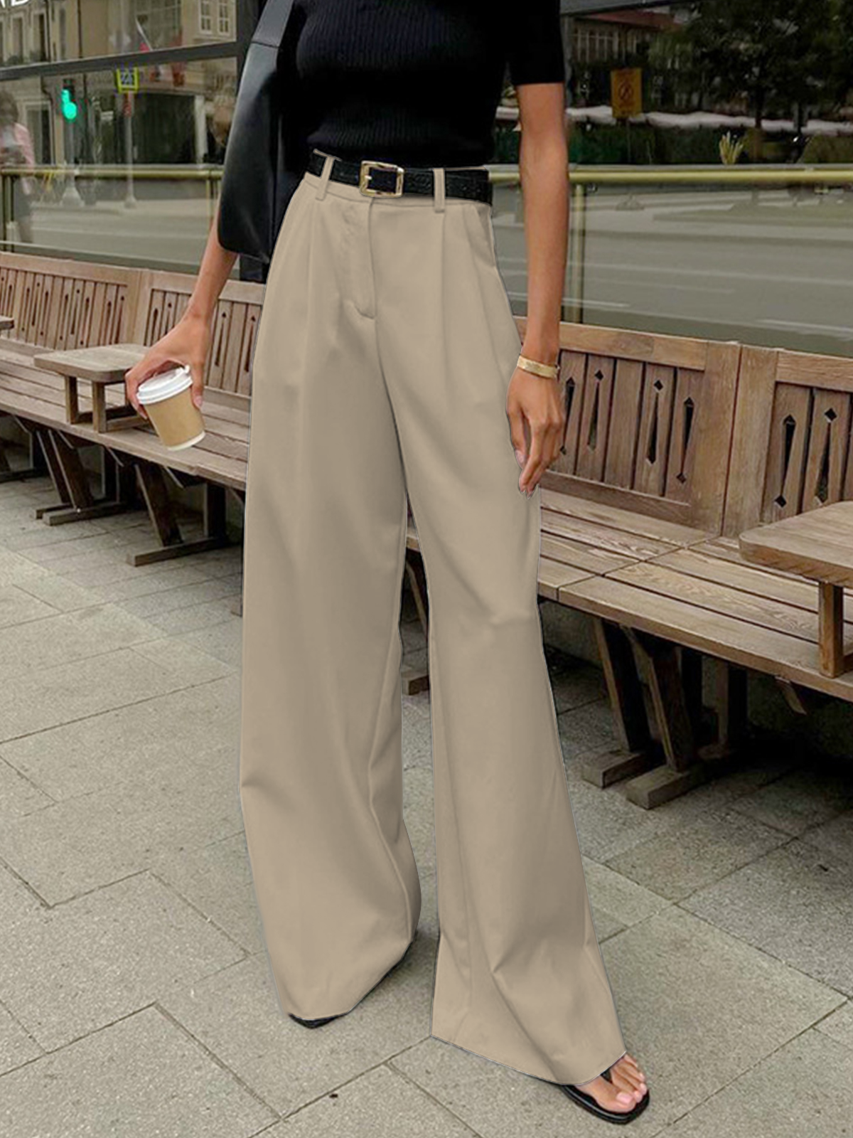 Women's tailored trousers in classic neutral tone, structured slim cut with clean professional lines