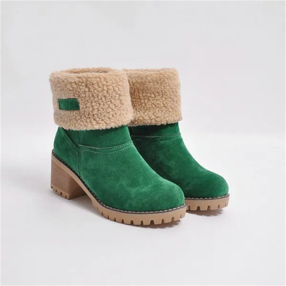 Women's mid-calf waterproof boots with soft lining, sleek silhouette, and all-weather cushioned sole