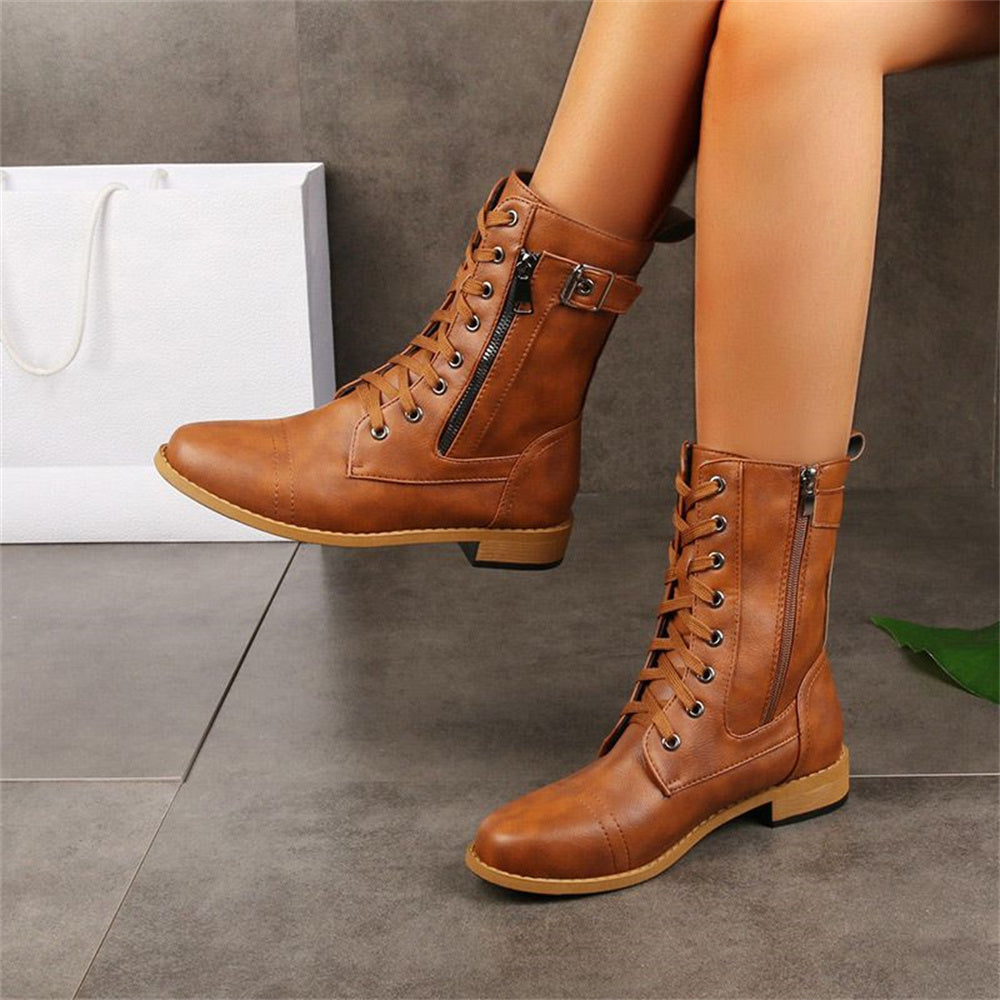 Black comfort ankle boots with toe-side zipper closure and cushioned supportive insole