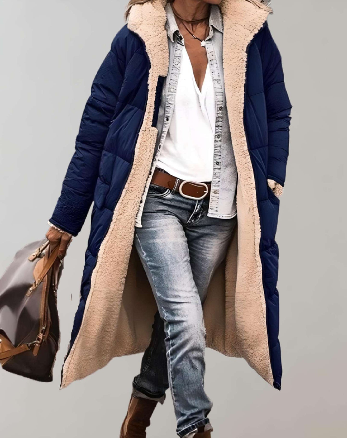 Women's full-length quilted puffer coat in relaxed fit with attached hood for cozy winter warmth
