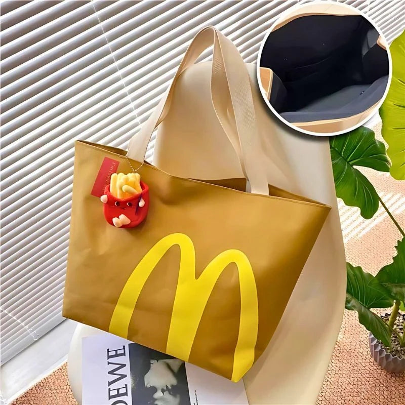 McDonald's-inspired McCarry backpack golden arches bold graphic print spacious interior comfortable straps