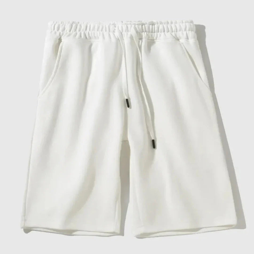 Men's relaxed knee-length jogger shorts in cotton-poly blend with adjustable drawstring waistband