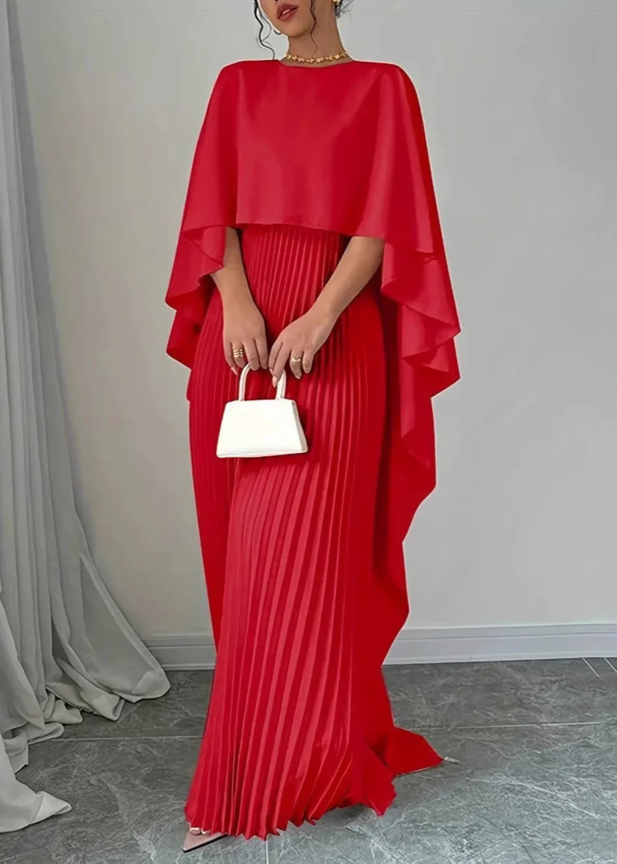 Women's pleated cape overlay maxi dress elegant evening gown with structured pleats and draped shoulders