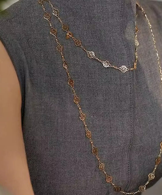 Magnifique collier en cuivre doré avec sculpture ajourée - Wavlynn