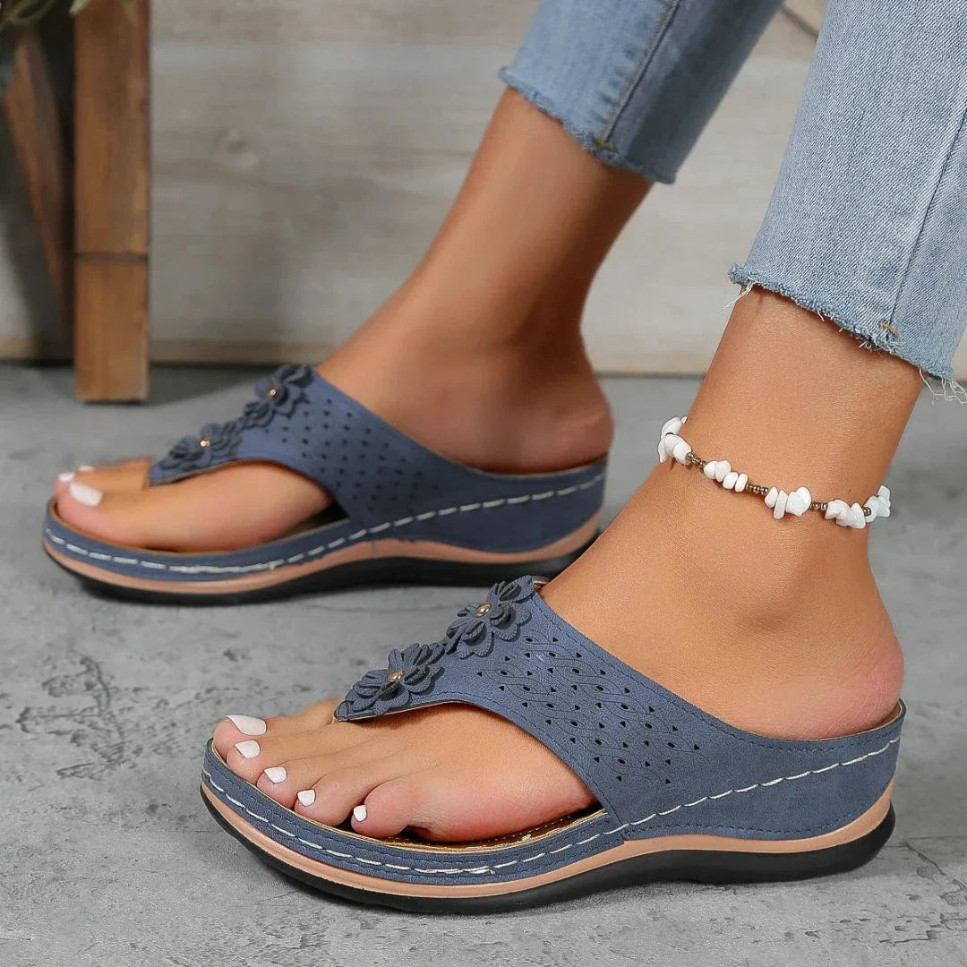 Women's floral comfort flip-flop sandals with 3D floral appliqué and cushioned ergonomic sole