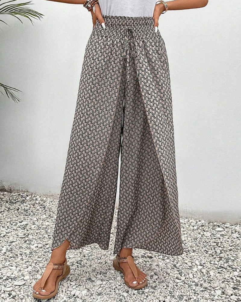 Bold geometric print wide-leg trousers in relaxed fit with striking all-day comfortable silhouette