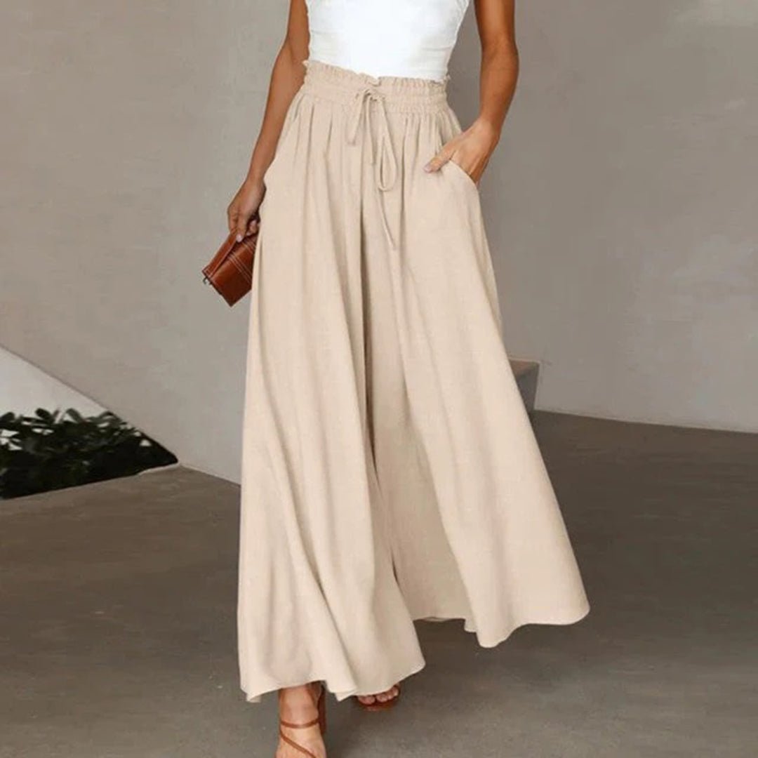 Women's terracotta high waist wide leg pants with smocked drawstring waistband and flowy silhouette