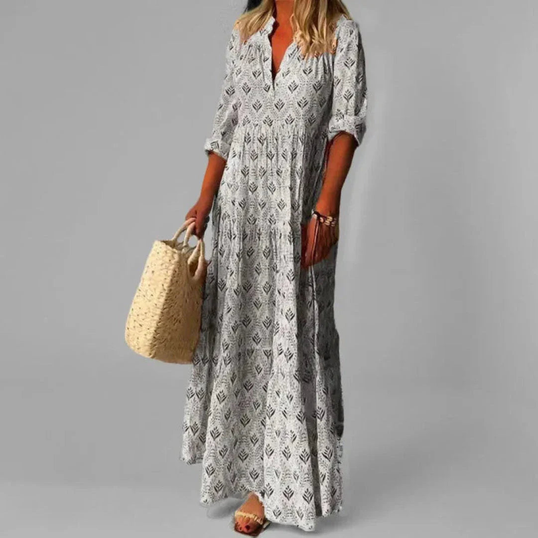 Floral vintage print maxi dress with stand collar, relaxed A-line silhouette in muted retro tones