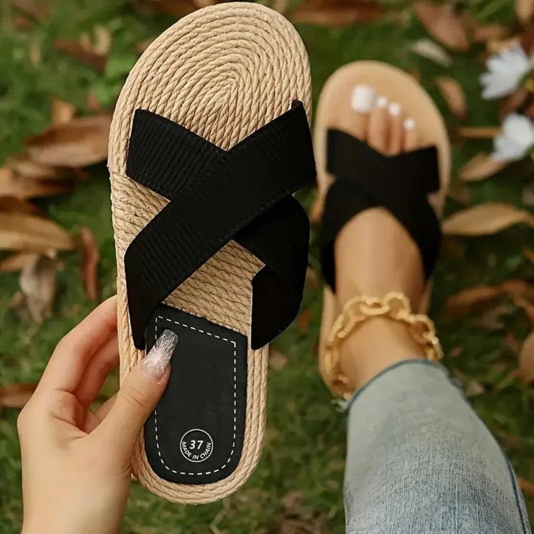 Beige slip-on sandals with criss-cross straps and braided sole, lightweight casual slide for women