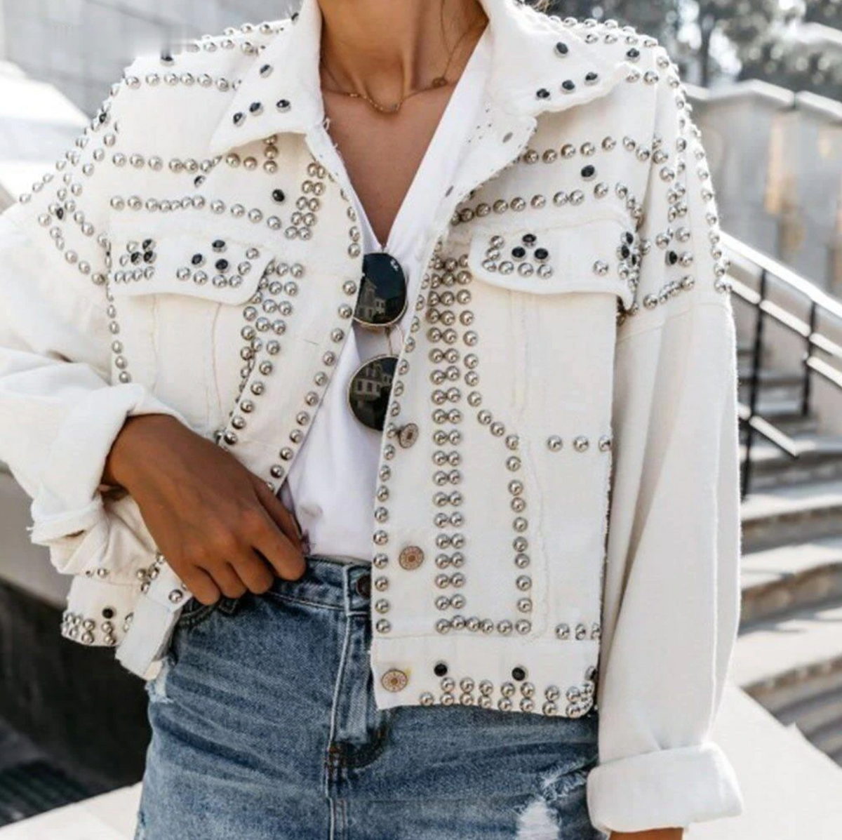 Women's black cropped jacket with silver metallic studs bold hardware streetwear style