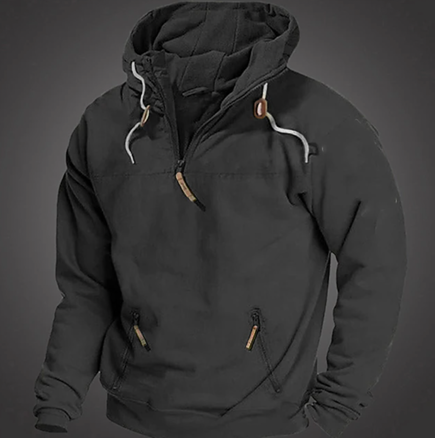 Men's casual relaxed fit long sleeve hoodie with half-zip closure, drawstring hood, and front zipper pockets