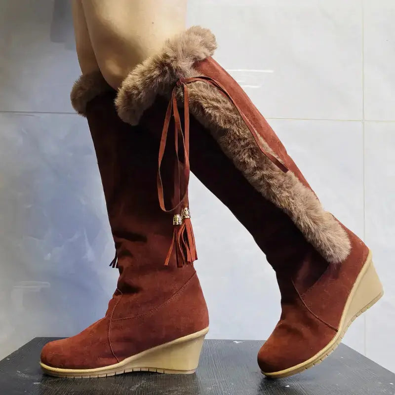 Women's knee-high synthetic leather combat boots with cozy lining, stylish winter design