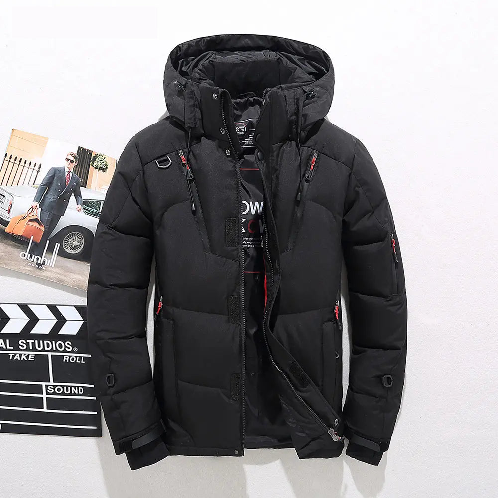 Men's black puffer jacket with detachable hood, storm flap, clean silhouette winter outerwear