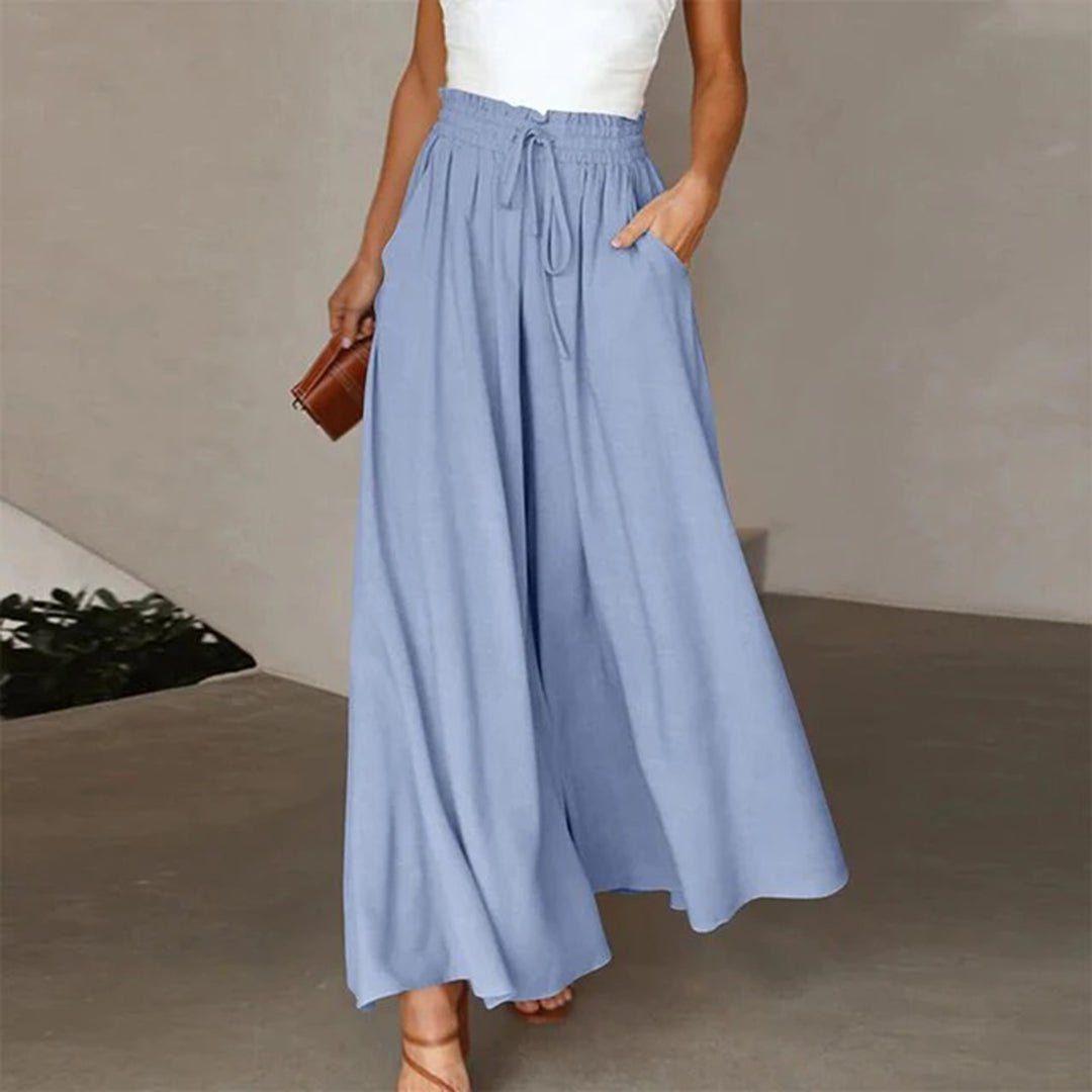 Women's terracotta high waist wide leg pants with smocked drawstring waistband and flowy silhouette